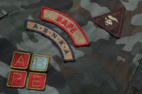 HYBRID CAMO MULTI BADGE CARGO PANTS