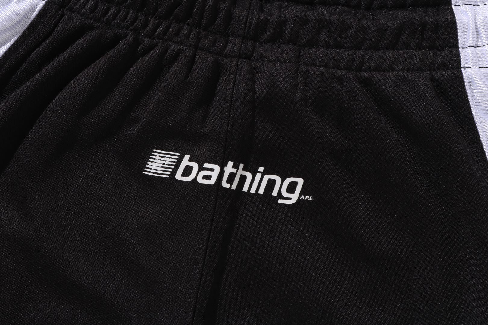 A BATHING APE® Multi Logo Relaxed Fit Soccer Shorts | Bape
