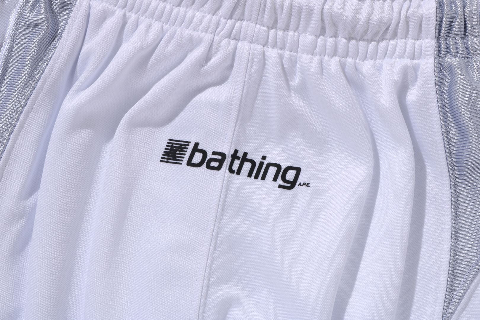 A BATHING APE® Multi Logo Relaxed Fit Soccer Shorts | Bape