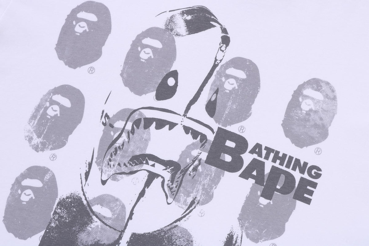 SPRAY PRINT MULTI LOGO RELAXED FIT TEE